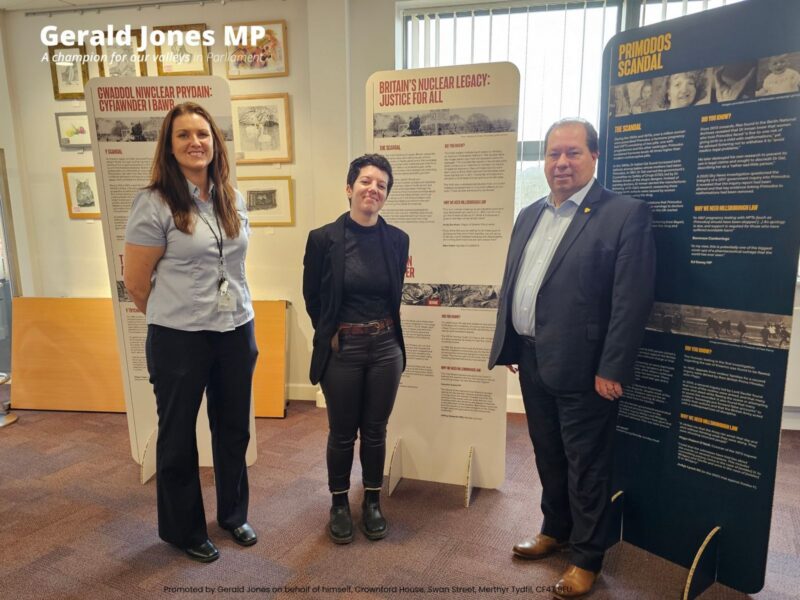 Image of Gerald Jones MP with Sara and Lucia at the exhibition.