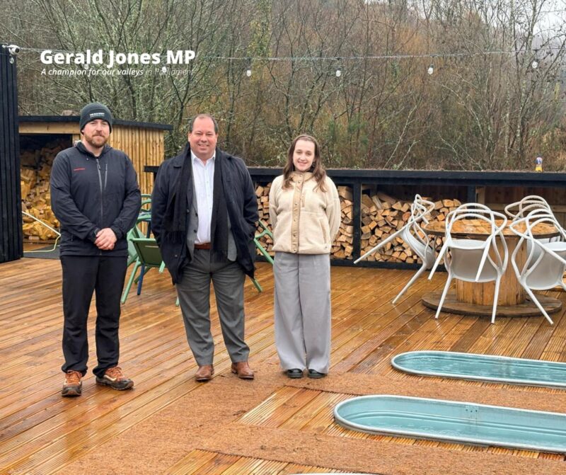 Image of Gerald Jones with Andrew and team at the wellness centre.