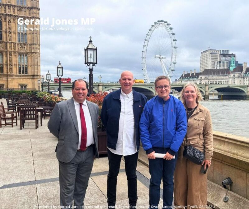 Image of residents with Gerald Jones MP on the terrace.