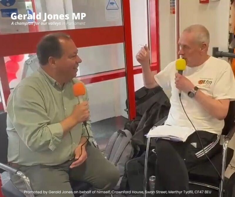 Image of Gerald Jones MP speaking with GTFM on live radio.