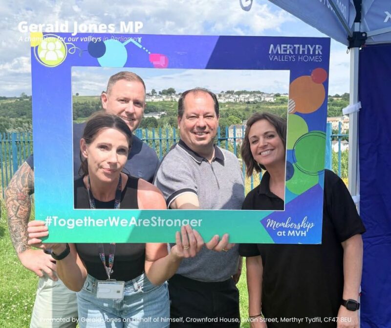 Image of Gerald Jones MP with staff of Merthyr Valleys Homes.